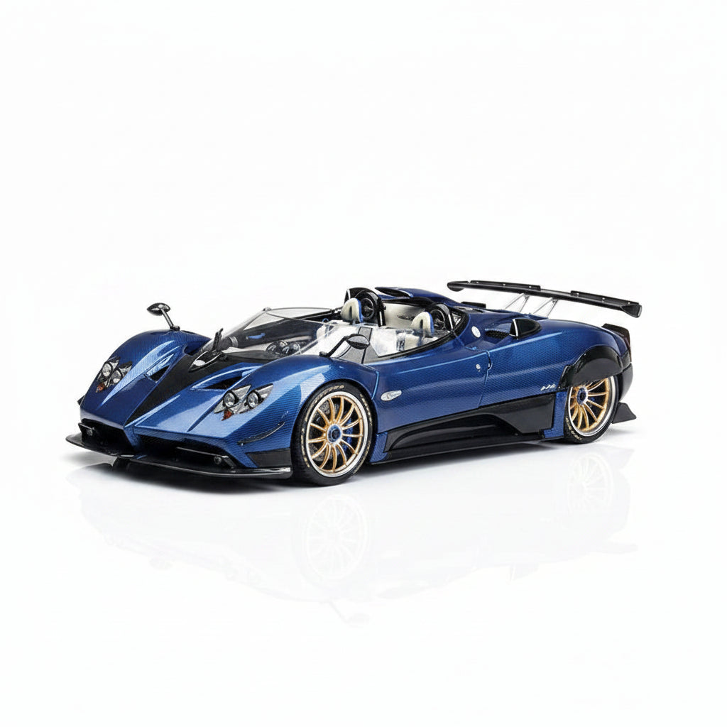 Blue sports car with gold wheels on a gray textured background